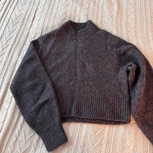 100% wool grey sweater with lurex.  Worn one time. Looks brand new.